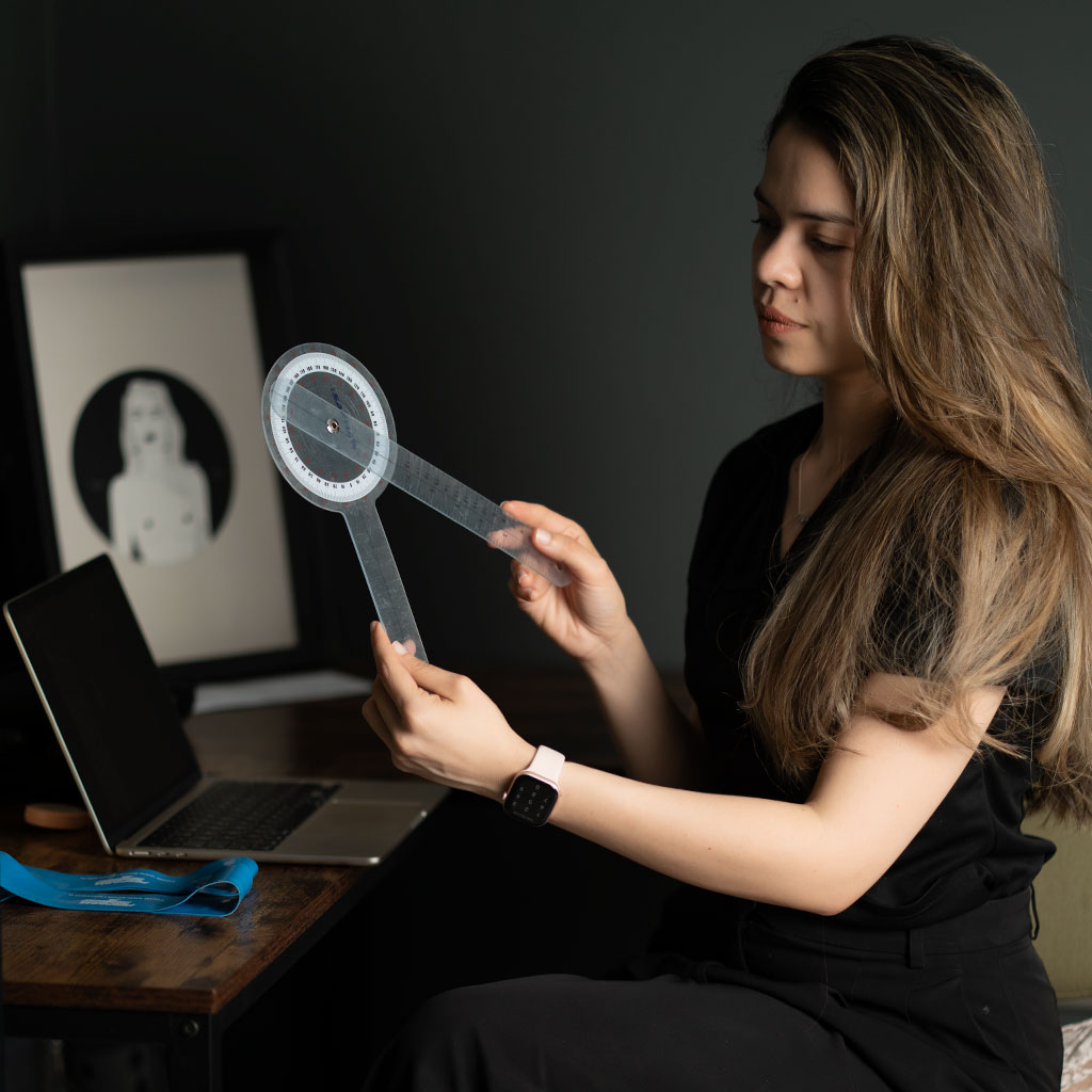 Bel measuring range of motion with a goniometer